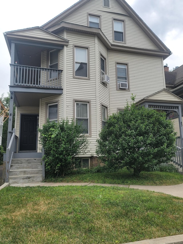 41 Mahl Ave, Hartford, CT 06154 - view of side of property featuring a balcony and a lawn
