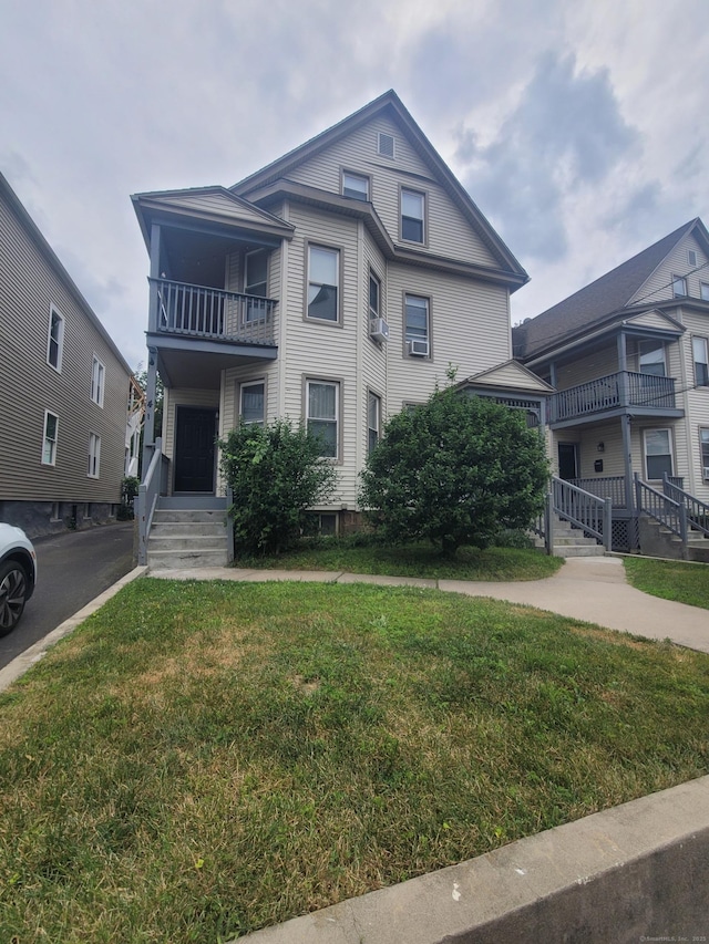 41 Mahl Ave, Hartford, CT 06154 - view of property featuring a balcony and a front yard