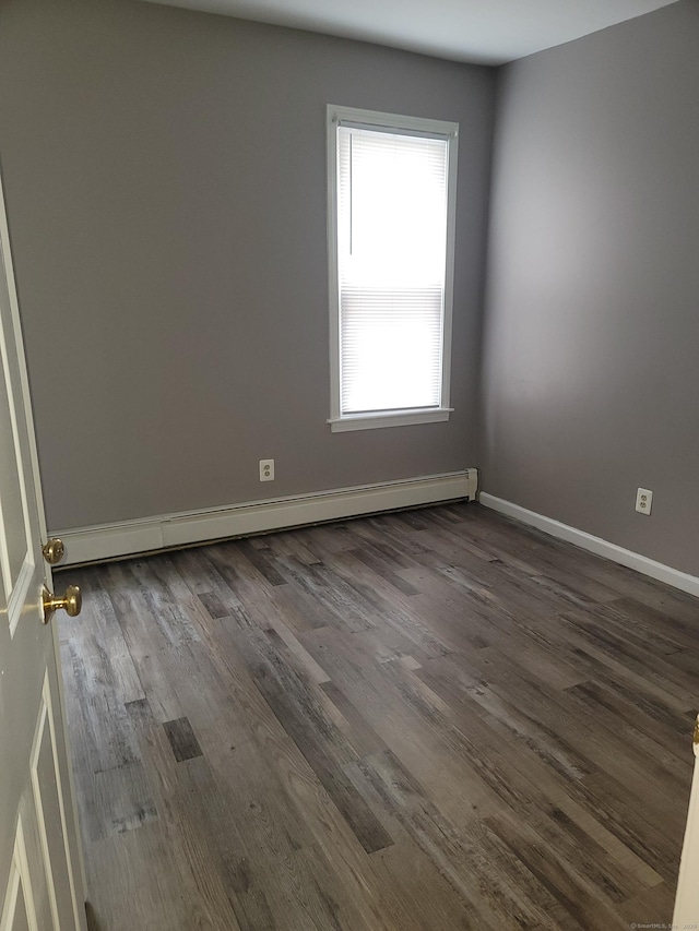 41 Mahl Ave, Hartford, CT 06154 - spare room with baseboard heating and dark wood-style floors