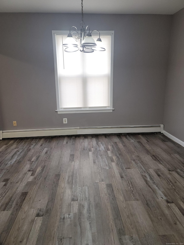 41 Mahl Ave, Hartford, CT 06154 - unfurnished dining area featuring a chandelier, a baseboard heating unit, and dark wood-type flooring