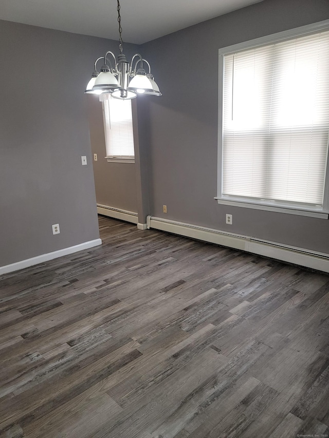 41 Mahl Ave, Hartford, CT 06154 - empty room featuring a baseboard radiator, a chandelier, and dark wood-style floors