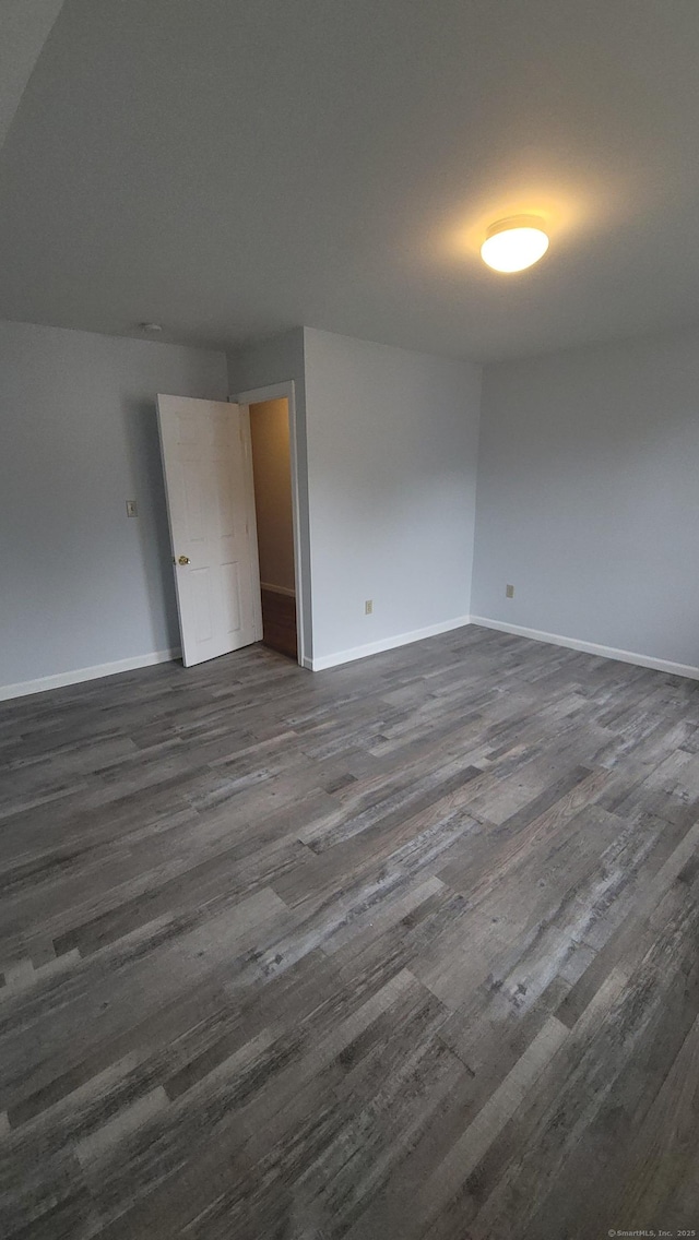 41 Mahl Ave, Hartford, CT 06154 - empty room with dark wood-type flooring and baseboards