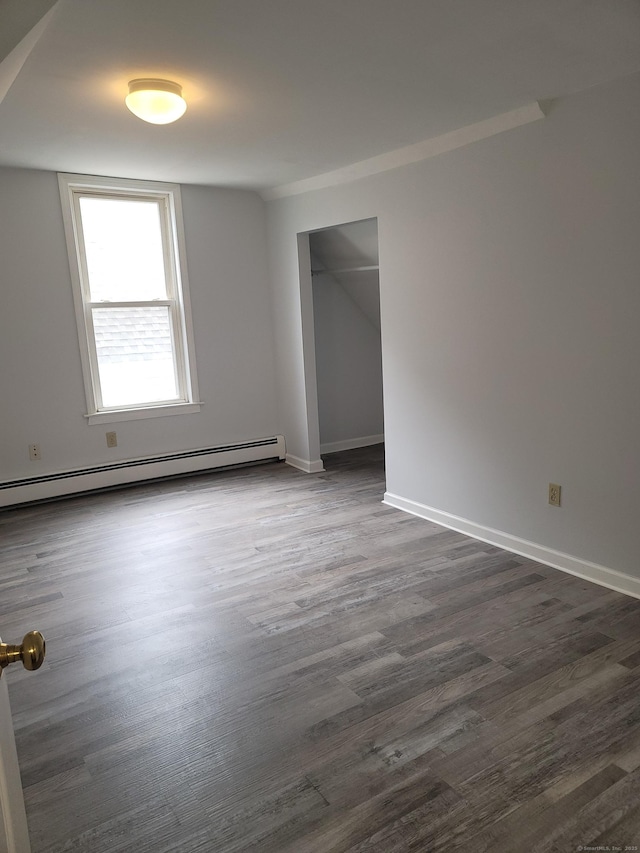 41 Mahl Ave, Hartford, CT 06154 - empty room featuring a baseboard radiator and dark wood-style flooring