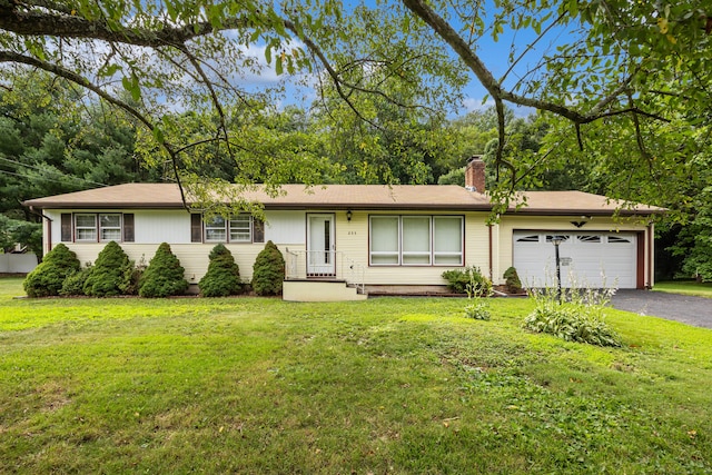 233 Mountain Rd, Cheshire, CT 06410 - ranch-style house featuring an attached garage, asphalt driveway, a chimney, and a front yard