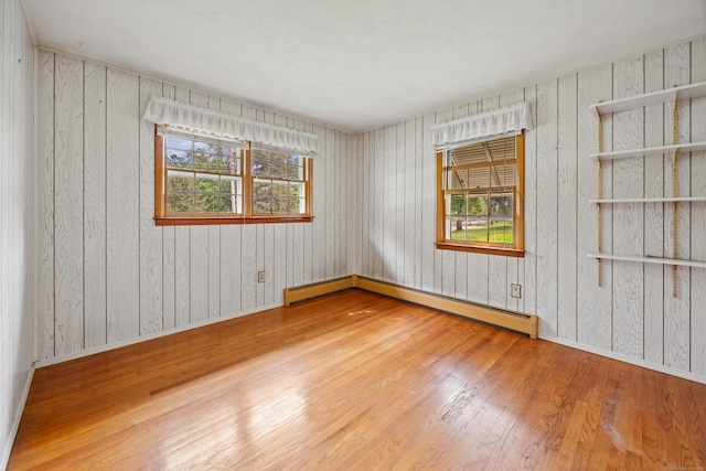 233 Mountain Rd, Cheshire, CT 06410 - spare room featuring wood finished floors and baseboard heating