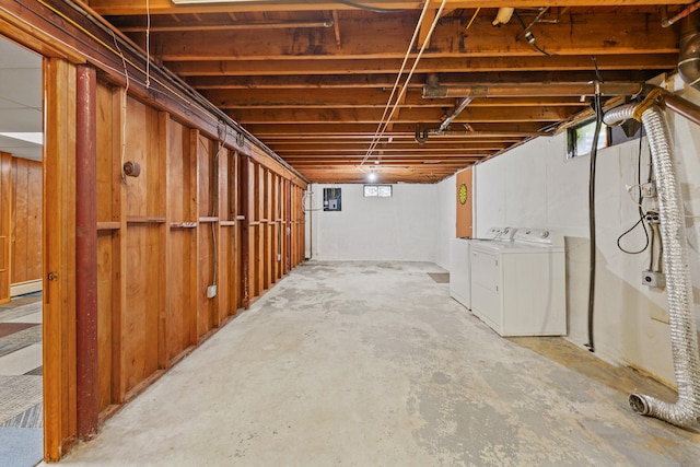 233 Mountain Rd, Cheshire, CT 06410 - below grade area featuring separate washer and dryer and baseboard heating