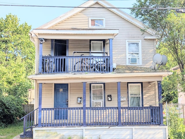 98 Sylvan Ave, New Haven, CT 06519 - shotgun-style home with a balcony and covered porch