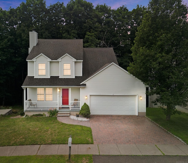 11 Adam Dr, Newington, CT 06111 - traditional-style house with covered porch, decorative driveway, a garage, a yard, and a chimney