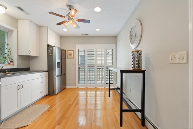 11 Adam Dr, Newington, CT 06111 - kitchen featuring stainless steel fridge with ice dispenser, ceiling fan, plenty of natural light, dark countertops, and recessed lighting