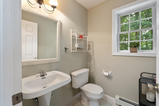 11 Adam Dr, Newington, CT 06111 - bathroom featuring baseboard heating, tile patterned flooring, and a chandelier