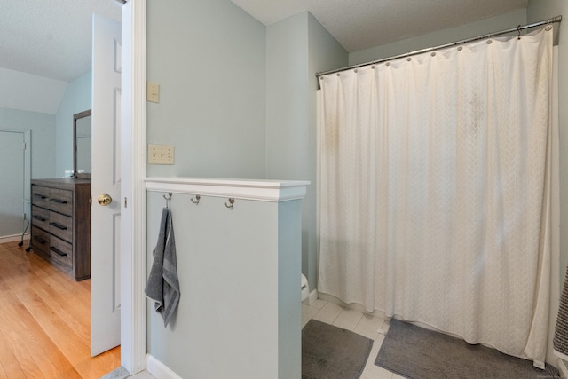 11 Adam Dr, Newington, CT 06111 - full bathroom with wood finished floors and a shower with shower curtain