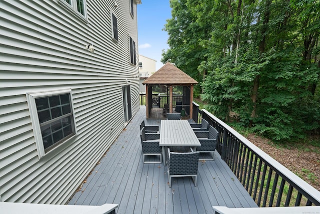 11 Adam Dr, Newington, CT 06111 - wooden deck with a gazebo and outdoor dining area