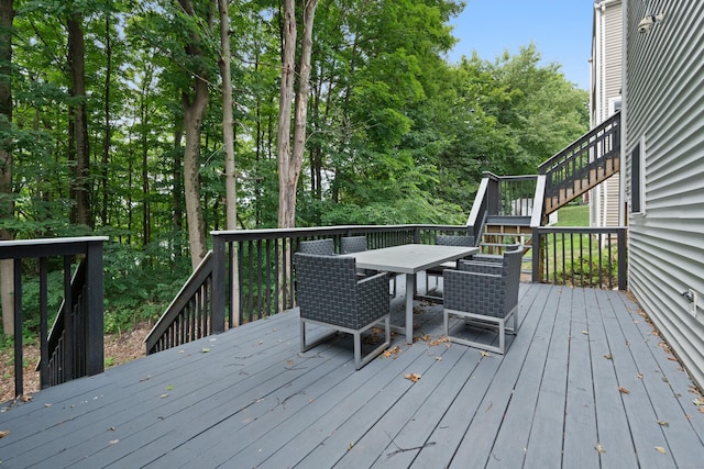 11 Adam Dr, Newington, CT 06111 - deck with stairway and outdoor dining space