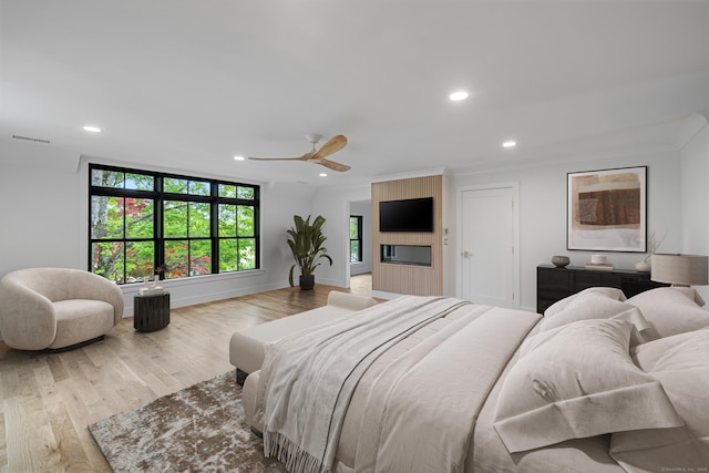 52 Garibaldi Ln, New Canaan, CT 06840 - bedroom with recessed lighting, wood finished floors, ornamental molding, and ceiling fan