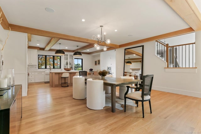 52 Garibaldi Ln, New Canaan, CT 06840 - dining area featuring light wood finished floors, beamed ceiling, a chandelier, recessed lighting, and stairs