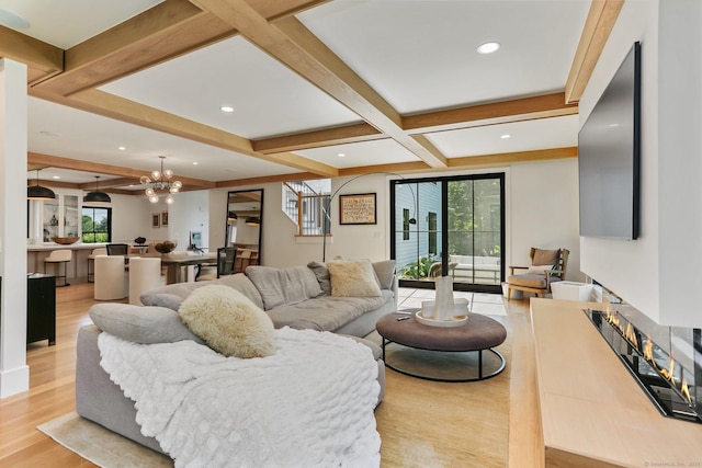 52 Garibaldi Ln, New Canaan, CT 06840 - living room with beamed ceiling, light wood-style floors, a chandelier, coffered ceiling, and recessed lighting
