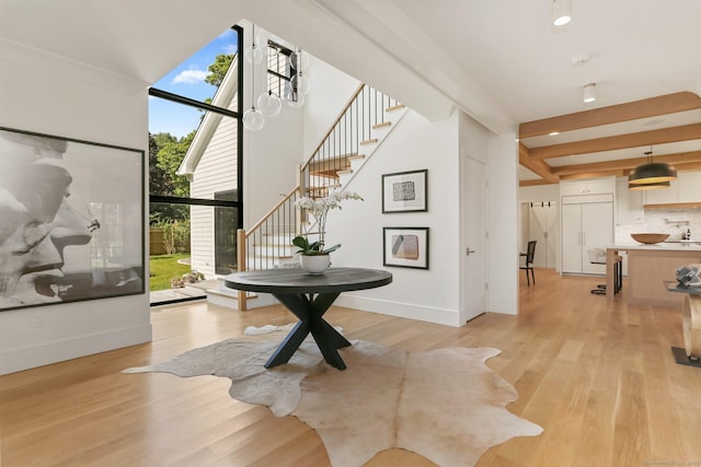 52 Garibaldi Ln, New Canaan, CT 06840 - corridor with stairway and light wood finished floors