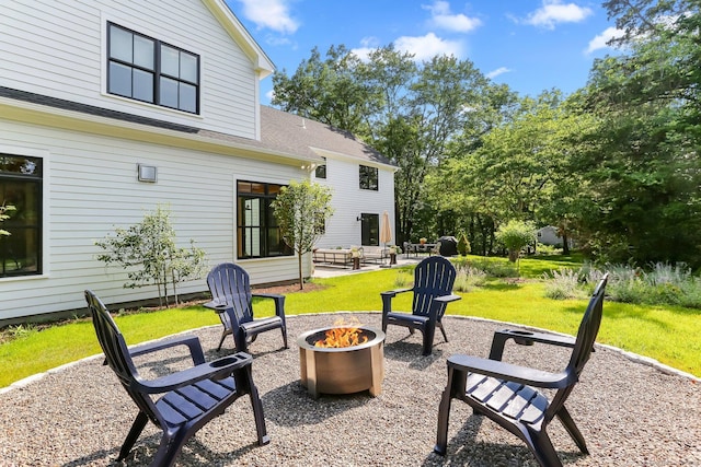 52 Garibaldi Ln, New Canaan, CT 06840 - view of patio featuring a fire pit