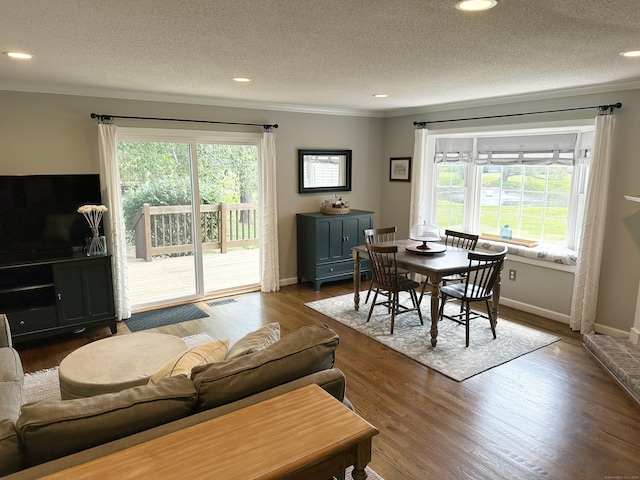 311 Georgetown Dr Unit 311, Glastonbury, CT 06033 - living room featuring crown molding, a textured ceiling, recessed lighting, and wood finished floors