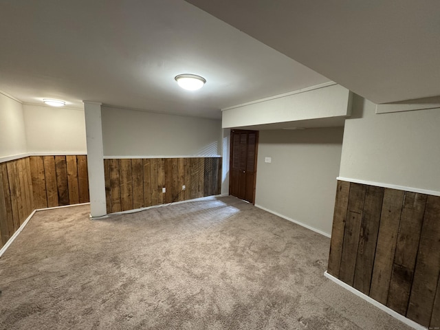 311 Georgetown Dr Unit 311, Glastonbury, CT 06033 - finished below grade area with wooden walls, carpet floors, and wainscoting