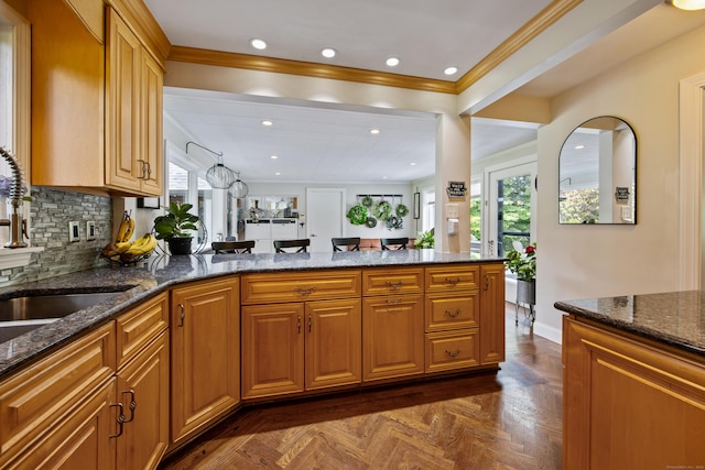 430 Cook Hill Rd, Cheshire, CT 06410 - kitchen featuring dark stone counters, a peninsula, recessed lighting, crown molding, and backsplash