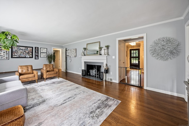 430 Cook Hill Rd, Cheshire, CT 06410 - living room with wood finished floors, a fireplace with flush hearth, and ornamental molding