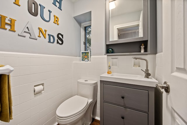 430 Cook Hill Rd, Cheshire, CT 06410 - bathroom featuring tile walls, vanity, and wainscoting