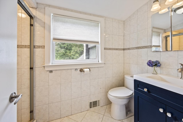 430 Cook Hill Rd, Cheshire, CT 06410 - bathroom featuring vanity, tile walls, tile patterned floors, and a tile shower