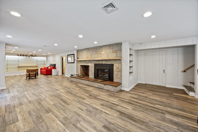 430 Cook Hill Rd, Cheshire, CT 06410 - living area featuring recessed lighting, wood finished floors, stairway, and a fireplace