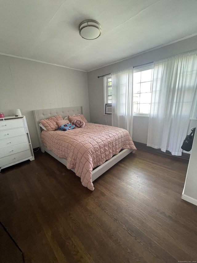 104 Terrace Ave, West Haven, CT 06516 - bedroom with dark wood finished floors and ornamental molding