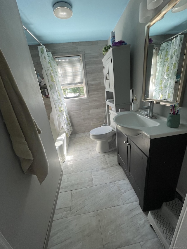 104 Terrace Ave, West Haven, CT 06516 - bathroom with vanity, tile walls, and shower / bath combination with curtain