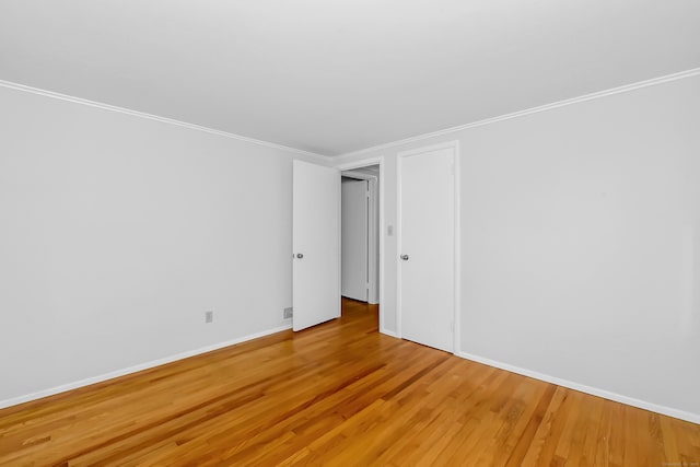 103 Colonial Dr, Fairfield, CT 06824 - unfurnished room featuring light wood-type flooring and crown molding