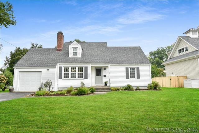 103 Colonial Dr, Fairfield, CT 06824 - cape cod-style house with an attached garage, a chimney, and driveway