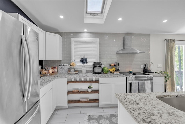 202A Hartford Pike, Foster, Rhode Island, RI 02825 - kitchen featuring appliances with stainless steel finishes, wall chimney range hood, decorative backsplash, white cabinetry, and recessed lighting