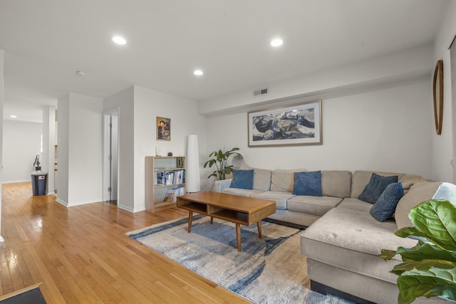 267 Melba St Apt D10, Milford, CT 06460 - living room featuring hardwood / wood-style flooring and recessed lighting