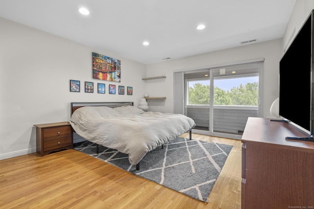 267 Melba St Apt D10, Milford, CT 06460 - bedroom with access to outside, light wood finished floors, and recessed lighting