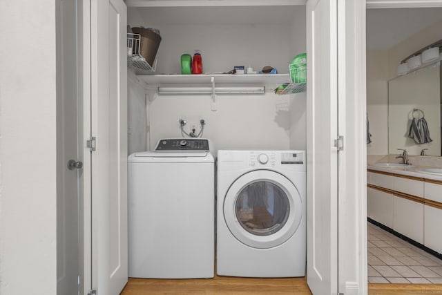 267 Melba St Apt D10, Milford, CT 06460 - laundry area with washing machine and clothes dryer and light wood finished floors