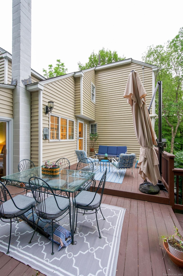 593 Northfield Rd, Watertown, CT 06795 - wooden deck with outdoor dining space and an outdoor hangout area
