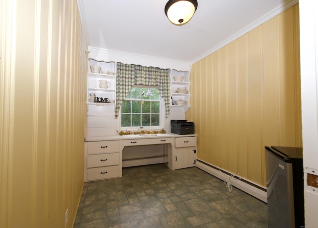 593 Northfield Rd, Watertown, CT 06795 - office featuring a baseboard heating unit, a baseboard radiator, ornamental molding, built in desk, and stone finish flooring