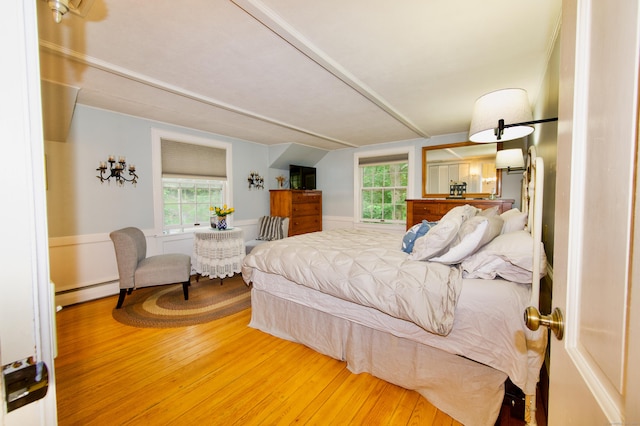 593 Northfield Rd, Watertown, CT 06795 - bedroom featuring wood finished floors, baseboard heating, and multiple windows