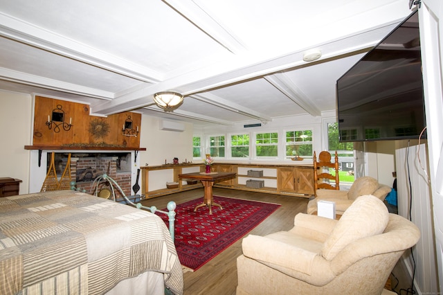 593 Northfield Rd, Watertown, CT 06795 - bedroom featuring wood finished floors, a wall mounted air conditioner, and beamed ceiling