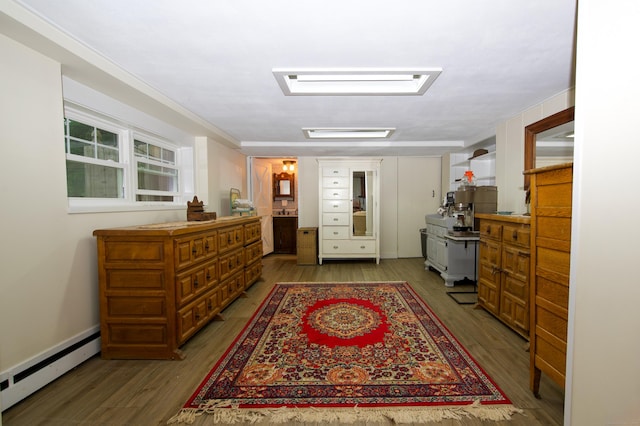 593 Northfield Rd, Watertown, CT 06795 - bedroom featuring baseboard heating and wood finished floors