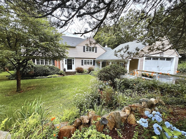 593 Northfield Rd, Watertown, CT 06795 - view of front of property featuring a front yard, a garage, and a shingled roof