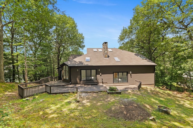 202 High Wood Dr, Glastonbury, CT 06073 - back of house with a chimney, a wooden deck, and a shingled roof