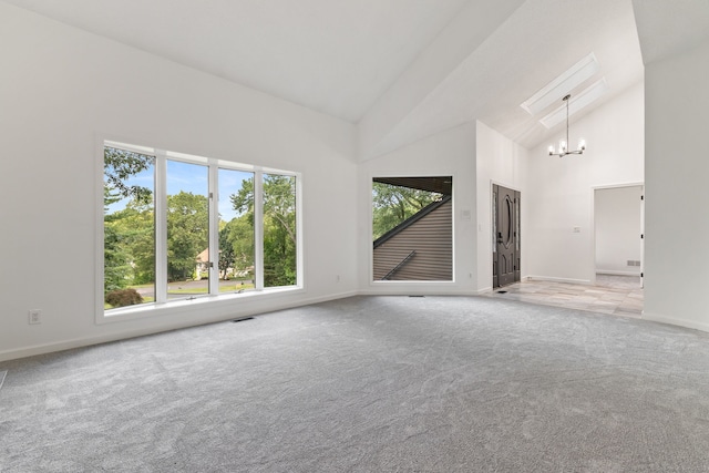 202 High Wood Dr, Glastonbury, CT 06073 - unfurnished living room with high vaulted ceiling, a chandelier, and carpet floors