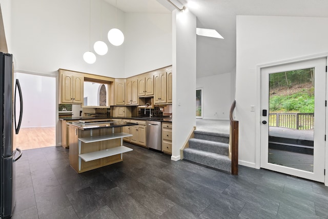 202 High Wood Dr, Glastonbury, CT 06073 - kitchen with dishwasher, high vaulted ceiling, freestanding refrigerator, dark countertops, and a center island