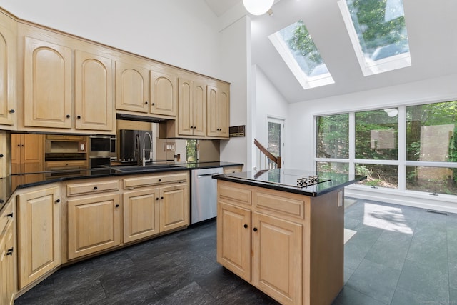 202 High Wood Dr, Glastonbury, CT 06073 - kitchen featuring stainless steel dishwasher, light brown cabinetry, a skylight, dark countertops, and high vaulted ceiling