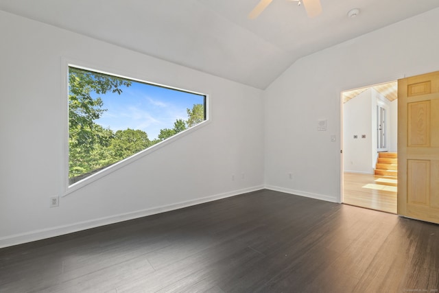 202 High Wood Dr, Glastonbury, CT 06073 - empty room with lofted ceiling, dark wood-style floors, ceiling fan, and a smoke detector