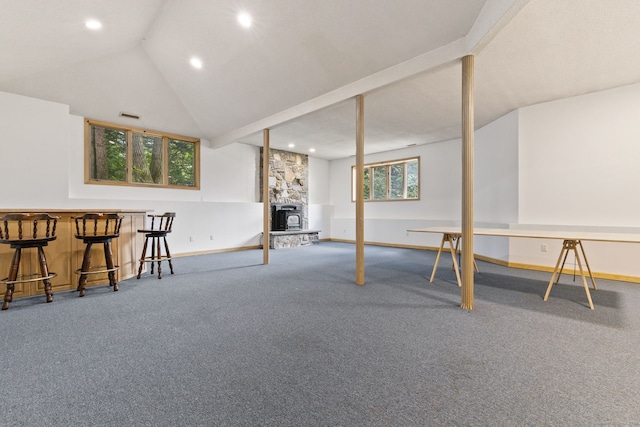 202 High Wood Dr, Glastonbury, CT 06073 - game room with carpet, a bar, recessed lighting, vaulted ceiling, and a wood stove