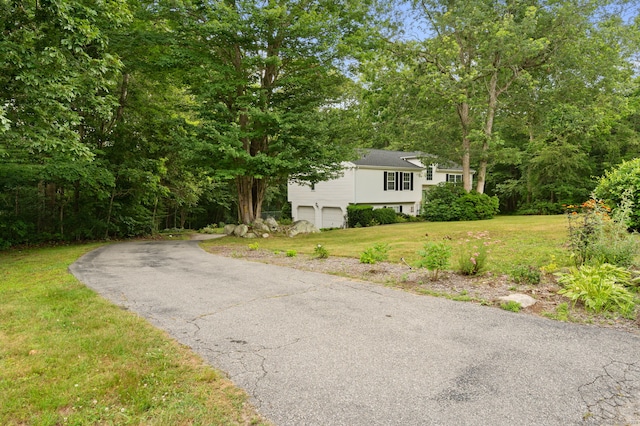 19 Peach Tree Hill Ave, Ledyard, CT 06339 - view of front of house with a garage, a front yard, and driveway
